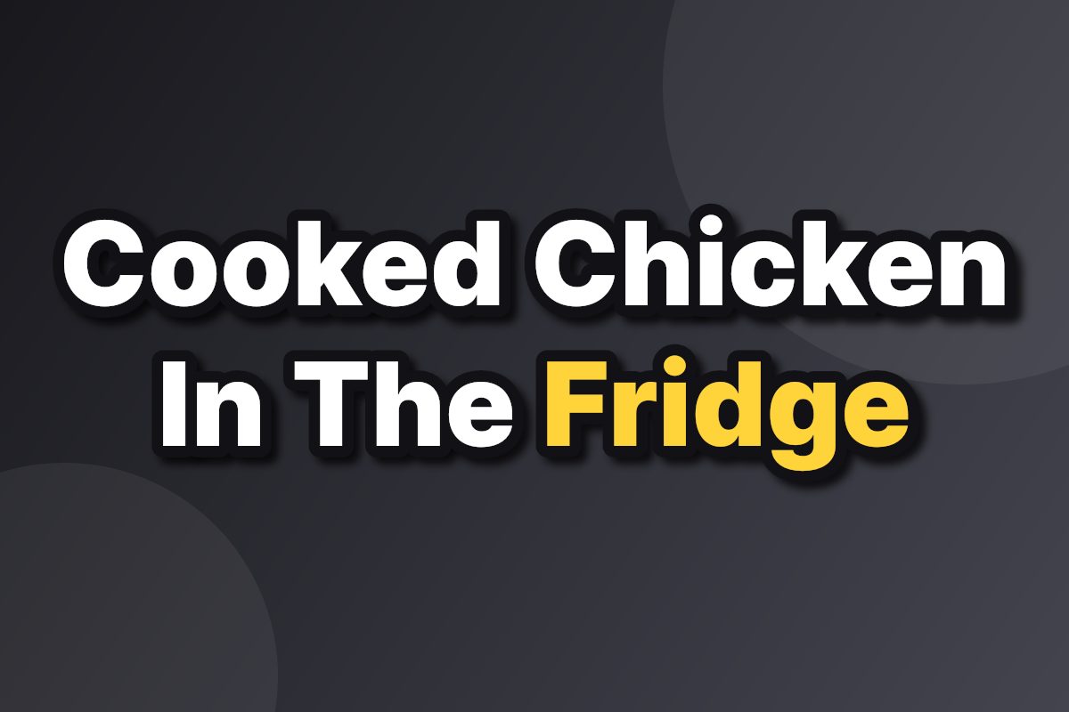 Glass meal prep containers filled with cooked chicken and vegetables on a kitchen counter