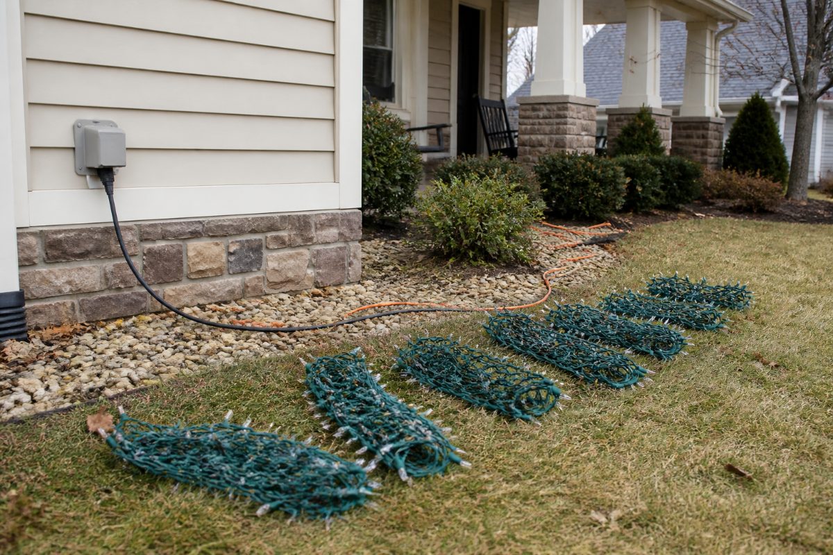 Christmas light sections and protected plug connections laid out for testing.